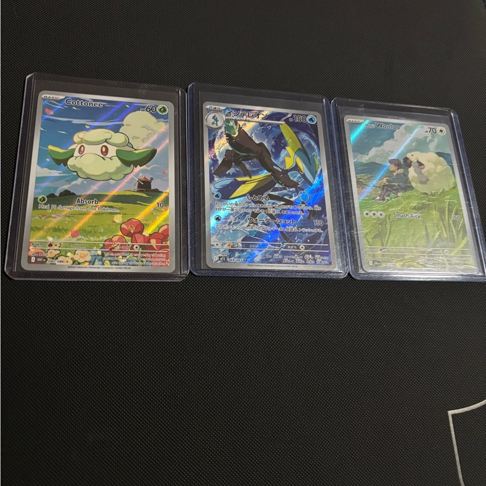 Set of 3 Pokémon Cards.